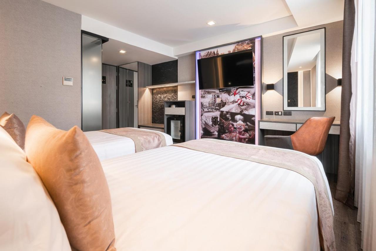 Aspira Gems Center Silom Hotell Bangkok Rom bilde